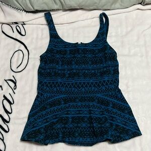 Express S women’s black and blue pattern tank top that flares out.